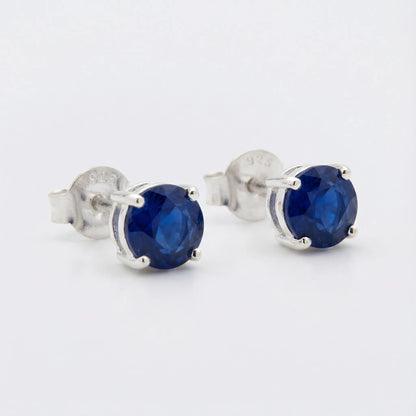 Boucles d'oreilles puces saphir bleu en argent rhodié 925
